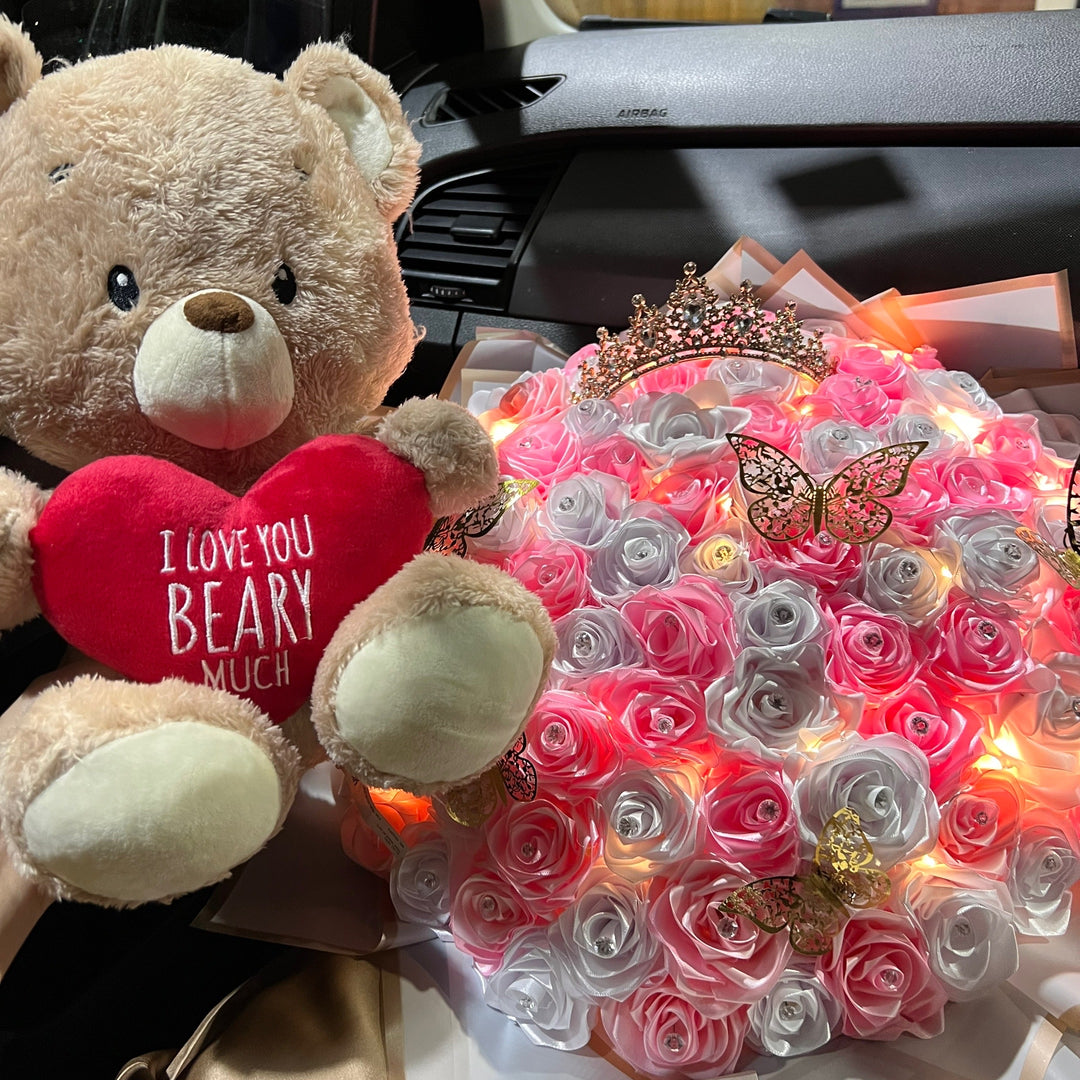 100 pink and white roses with teddy