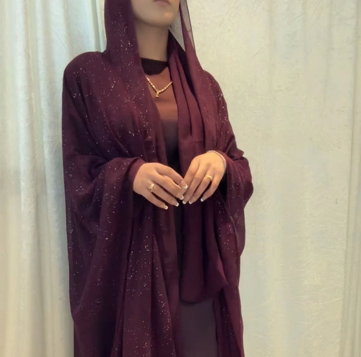 Satin slip dress with sparkly outer abaya